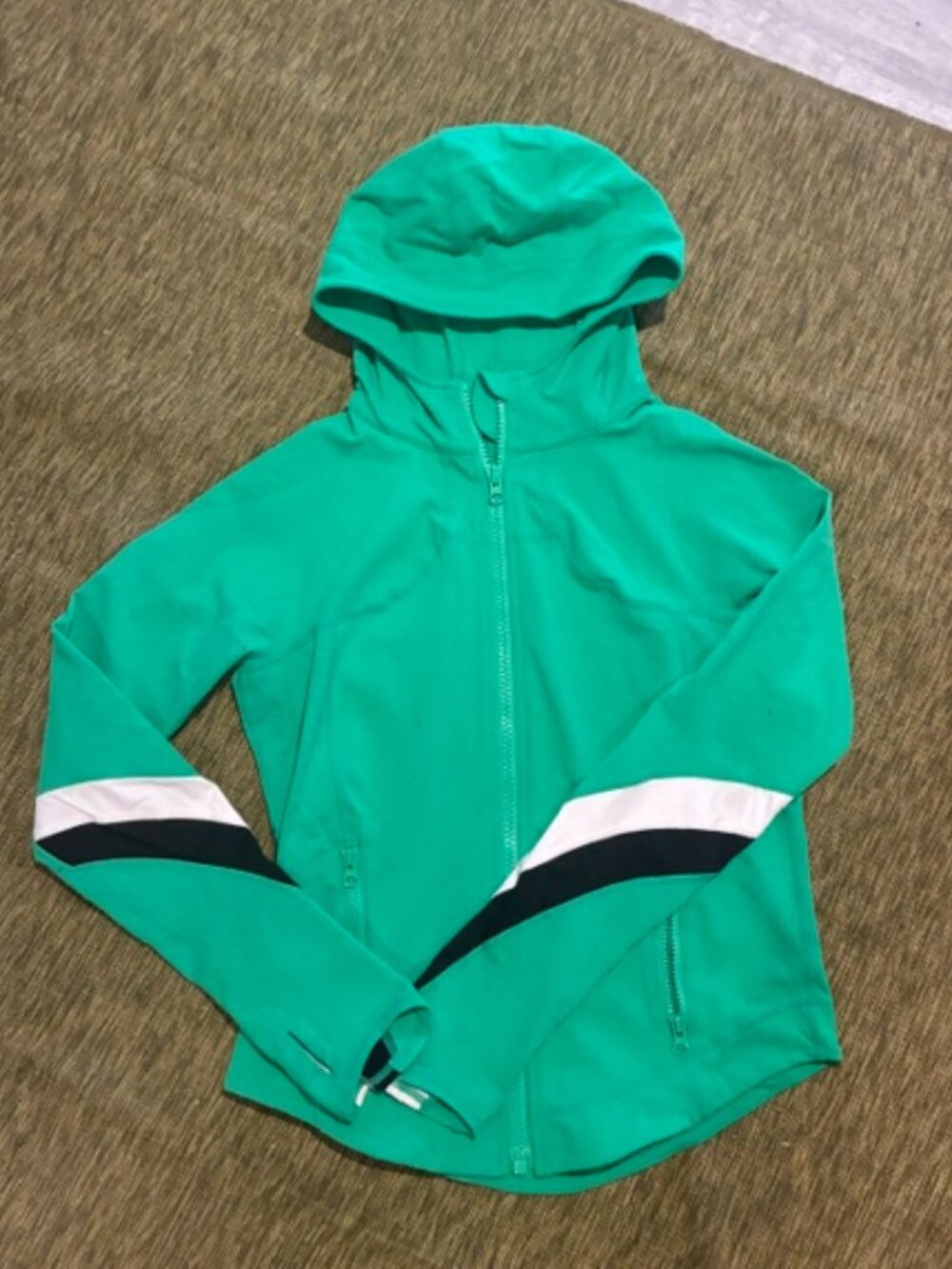 Lululemon jacket size 10,  with a hood.